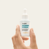 Super Pró-Colágeno 10% Sallve 30ml na mão – frasco com conta-gotas